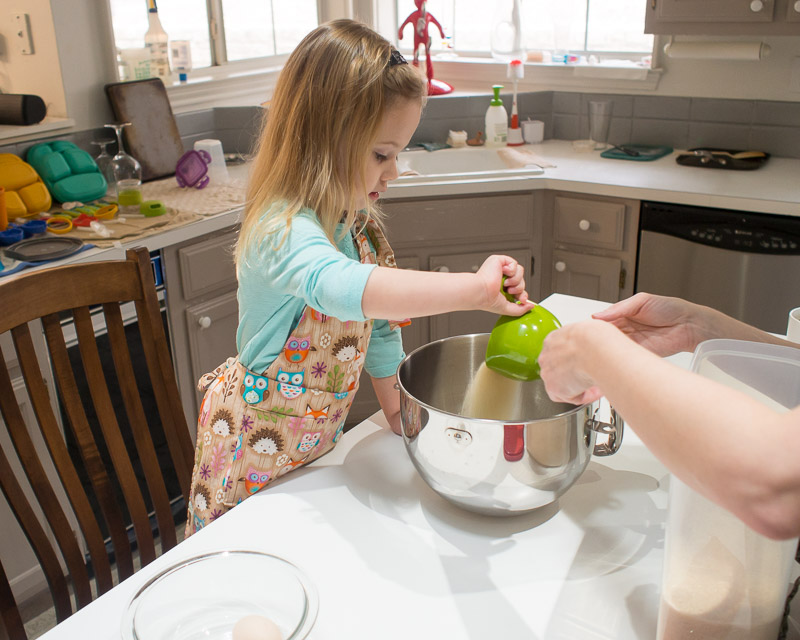 Maya dumping sugar.